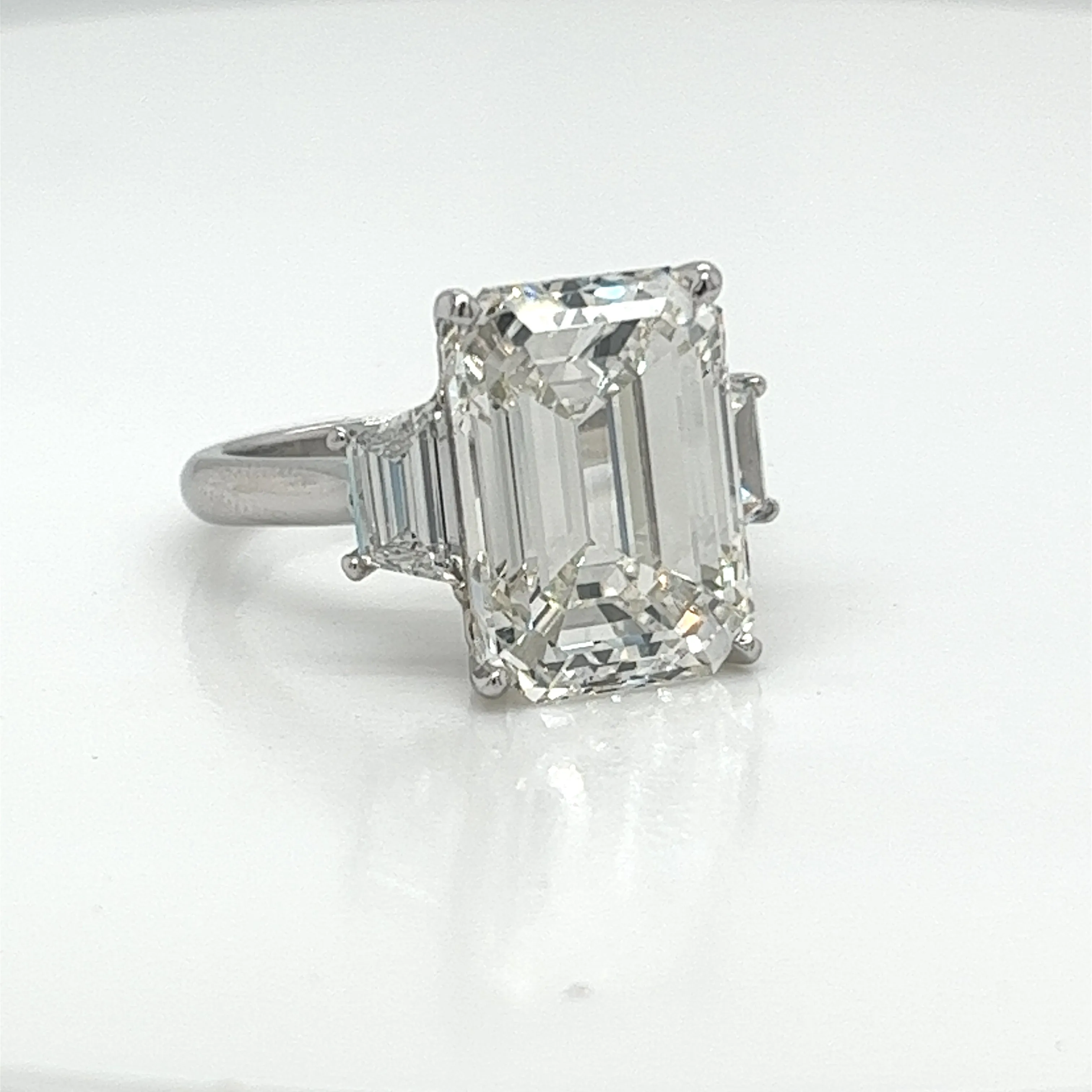 Kassidy 10 Carats Emerald Diamond Flanked By Trapezoids ThreeStoneRing in White Gold GIA Certified